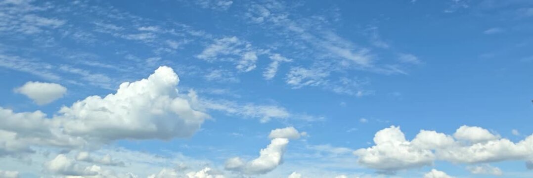 Cloudscape, Timelapse of Blue sky cloudscape with towering white clouds and wispy clouds for a natural background