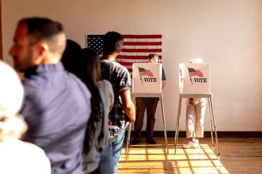 Voting booth with American flag
