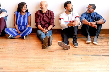 Fototapeta premium Diverse group sitting together happily.