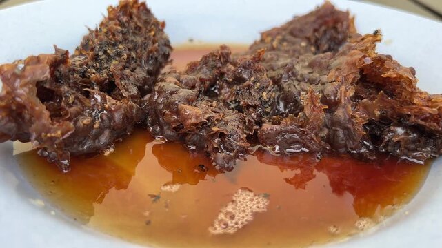 Klenceng bee nest (Apis florea) with the condition of the nest producing honey and eggs that have hatched. Klanceng bee larvae/pupae that have come out of the nest.