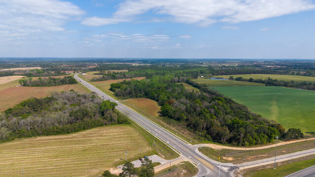 Aerial shot of vast trees and grass in Ashburn Georgia USA
