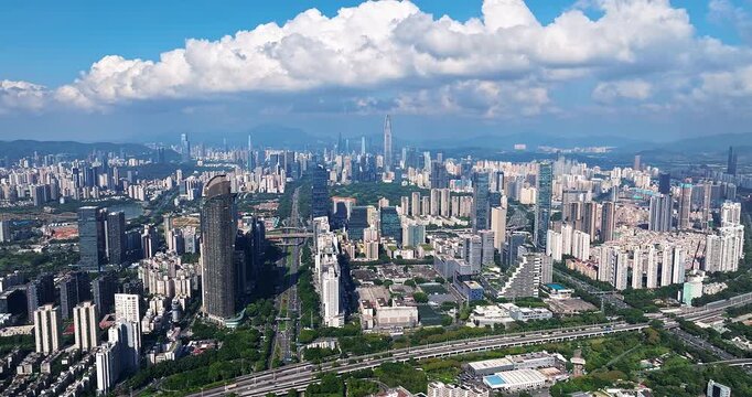 Aerial view of the modern financial district and skyscraper skyline in Shenzhen, China.