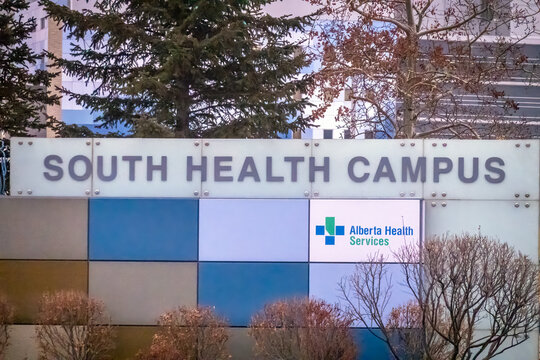 Calgary, Alberta, Canada. March 30, 2026. The exterior entrance sign for the South Health Campus hospital, featuring the Alberta Health Services logo.
