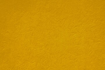 Obraz premium Textured vibrant yellow background