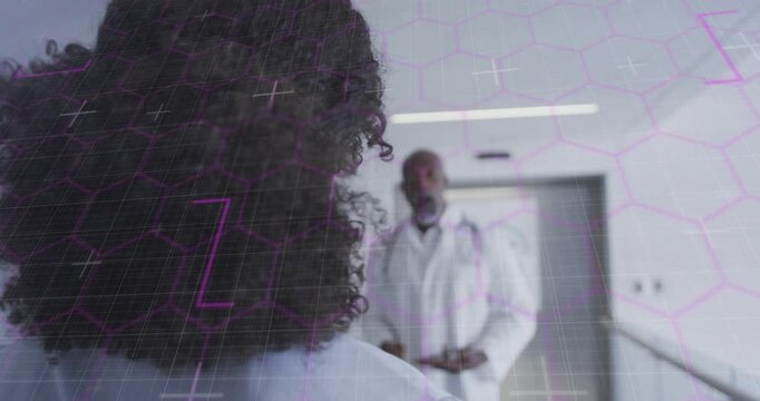 Vertical video: Elevator opening, doctor walking toward nurse, overlay showing data for consult