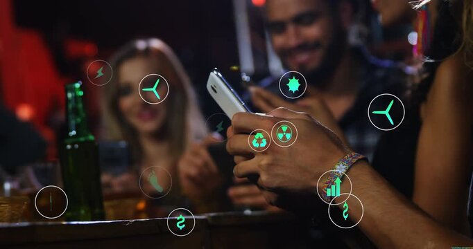Front woman holding white phone tapping, swiping and sharing green AR tech icons, friends watching