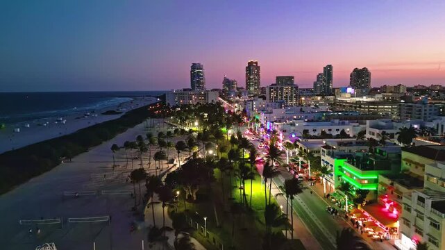 Miami beach sunset sky cityscape. Miami aerial skyline oceanfront. Miami waterfront coastal dusk. Miami Ocean drive seaside view.