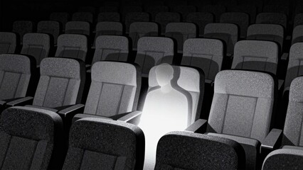 Fototapeta premium Glowing figure in empty theater
