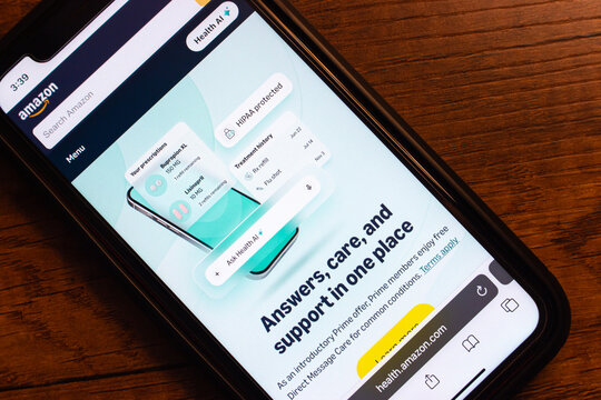 Mexico City, MEXICO - Mar 19 2026 : Closeup of a smartphone showing the Amazon Health website on a wooden table, highlighting telehealth, digital care and prescriptions.