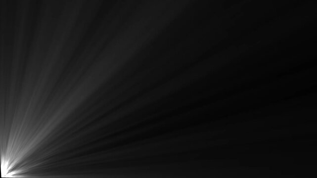 Light rays emerge from corner on black background.