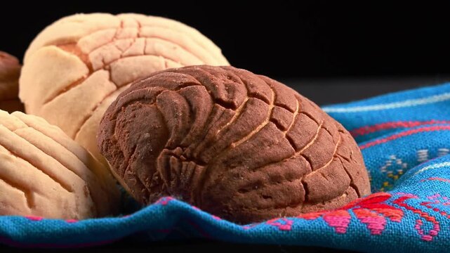Macro view of Mexican conchas with vanilla and chocolate flavors