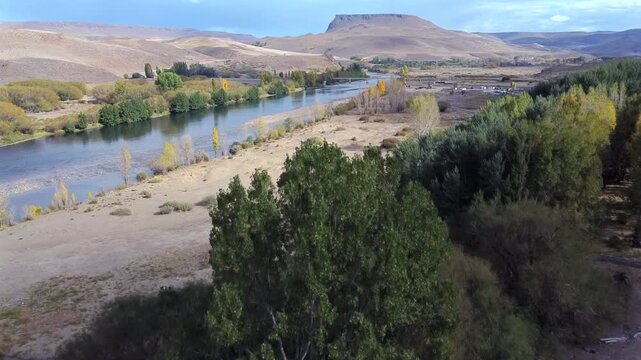 Aerial view of Route 40 crossing the Collon Cura River in the La Rinconada area Neuquen. Patagonian steppe landscape and semi-arid desert in southern Argentina.