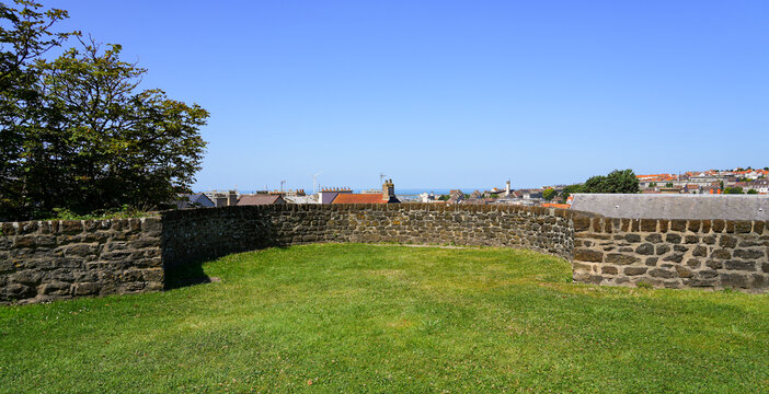 The scenic tree-lined walkway atop the medieval fortifications of Boulogne-sur-Mer, France