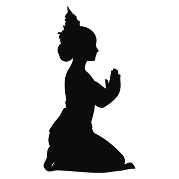 Silhouette of Traditional Thai Woman Kneeling in Prayer with Chada Headdress