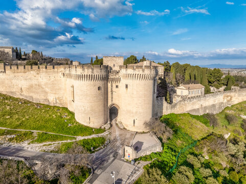 Explore Fort Saint-Andr&eacute;: Aerial view of Massive twin towers, crenelated ramparts in a stunning UNESCO-neighboring fortress in Provence France
