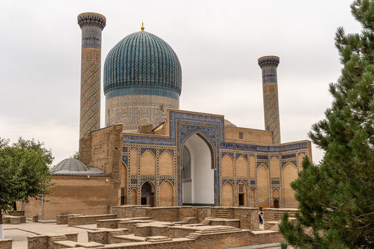 Facade and dome of Gur-e-Amir - a mausoleum of the Asian conqueror Timur. Translation on mosque: Tamerlane. Famous travel destination in Uzbekistan
