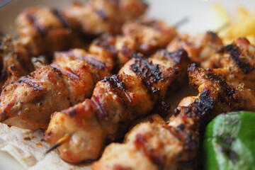 Grilled chicken kebabs served on a plate with vegetables © Towfiqu Barbhuiya 