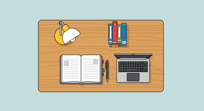 Desk with laptop and study materials.