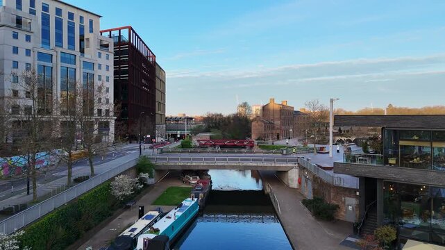 A low aerial view of  London Regents Canal at dawn.