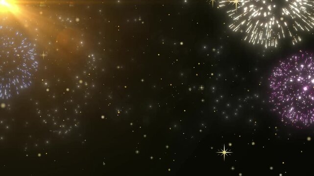 Colorful fireworks exploding in night sky with vibrant streaks of light