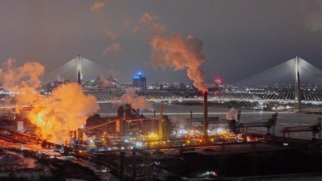 Zug Island industrial complex polluting Detroit River at night, Detroit, Michigan, USA