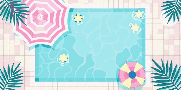 Aerial view of a turquoise swimming pool with colorful beach accessories