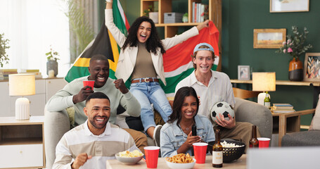 Excited, watching tv and friends with celebration in home for South African win, sports goal or snacks. Football fans, happy people and live stream with drinks for world cup match, team score or flag © peopleimages.com