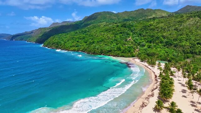 Sunlit mountain slopes with a palm-fringed beach on the Caribbean coast. A white sand beach and clouds in the sky above. A sea voyage during summer vacation. A tropical landscape of offshore islands.