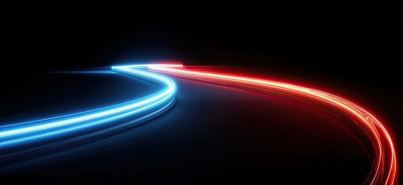 Two light trails, blue and red, curve and converge on a black background