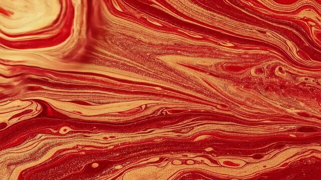 A vibrant abstract painting featuring swirling patterns of red, orange, and yellow hues