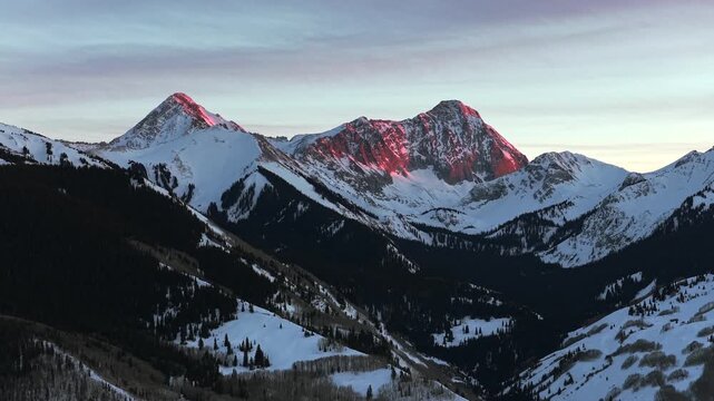 Fire Red Capitol Peak Wilderness winter vibrant sunset nature pano landscape aerial drone Colorado 14er Aspen Snowmass valley Elk Range last light Rocky Mountain Longs Peak Maroon Bells circle left