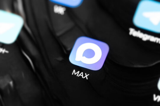 the max messenger logo on the smartphone screen
