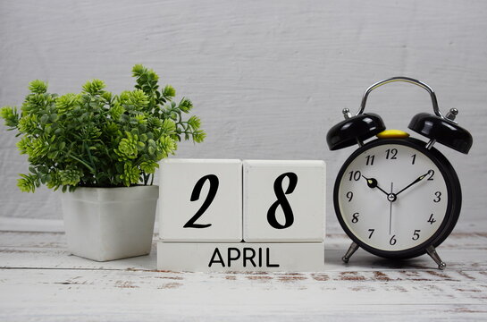 Wooden Calendar Showing the Date of April 28th. Day 28 of April month
