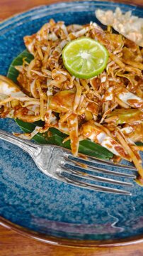 Indonesian raw vegetables salad (Karedok) with peanut sauce dressing

