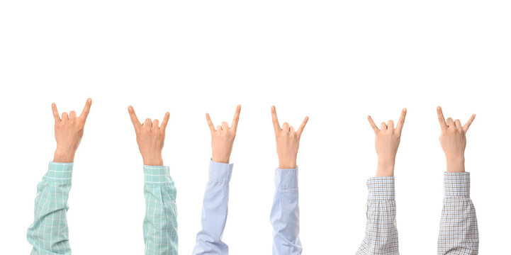 Many hands showing "devil horns" on white background