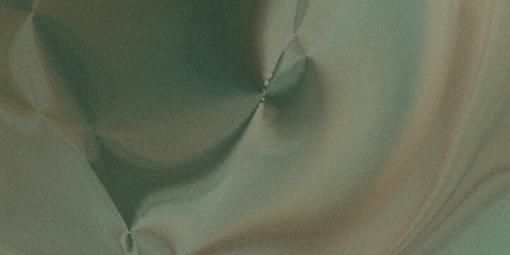 Close-up view of a dark object on a greenish fabric surface