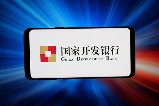 Stuttgart, Germany - 03-20-2026: In this photo illustration, the logo of institution China Development Bank (CDB) is displayed on a smartphone in front of abstract background on computer screen.