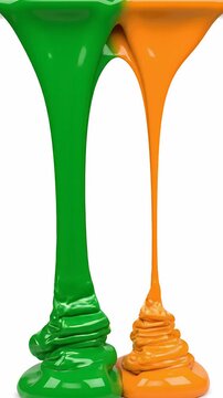 Green and Orange Goo Dripping Together on White Background
