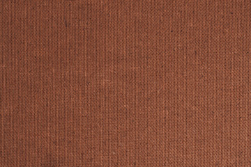 Fototapeta premium Brown fabric texture, visible weave pattern, woven pattern, organic material detail for design. Natural background, textile pattern, copy space