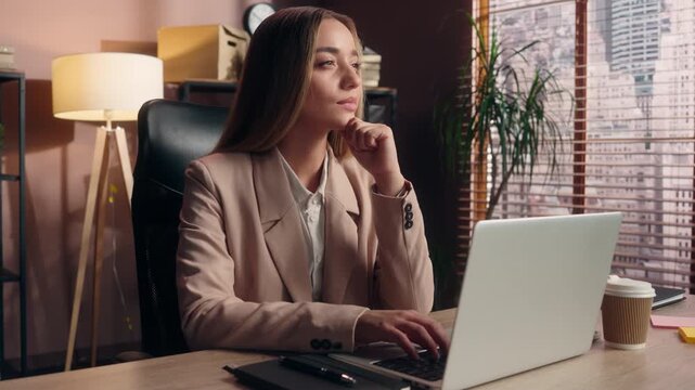 Caucasian business woman typing laptop thinking break pause considering ideas at office table productive businesswoman gitr female working computer think unsure deciding agent work online at company