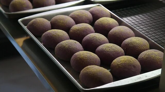 Freshly baked Filipino bread called Ube cheese pandesal
