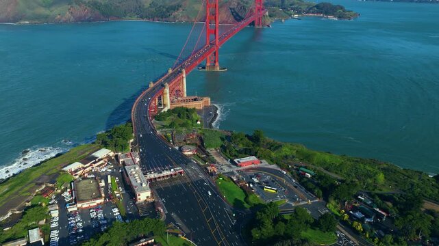 Toll Plaza Leading To Golden Gate Bridge Across San Francisco Bay Towards Marin County In California. aerial tilt-up shot