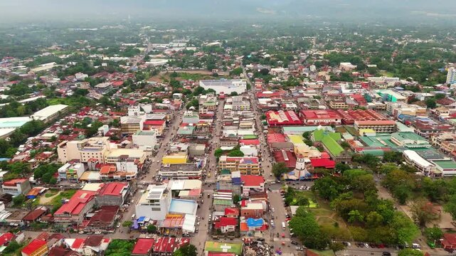 Stunning aerial drone shot of Rizal Boulevard in Dumaguete, Philippines, showcasing the coastal promenade and city landscape