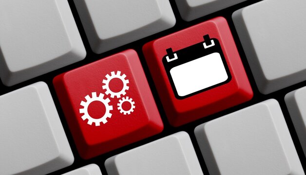 Computer Tastatur in rot: Termine im Kalender synchronisieren