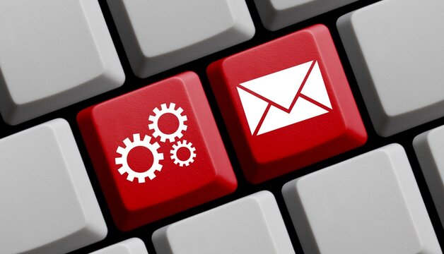 Computer Tastatur in rot: Mails synchronisieren