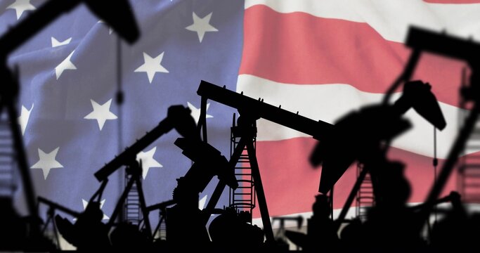 Depicting oil pump jacks showing walking beams and ladders at oilfield, with American flag backdrop