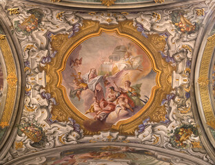 Obraz premium MONZA, ITALY - MARCH 19, 2026: The fresco of Theological Virtues - Faith, Hope, Charity in the Cathedral by Carlo Innocenzo Carloni (1738 -1740). 