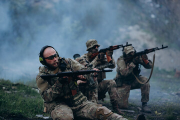Fototapeta premium Ukrainian militarymen with their rifles at the range