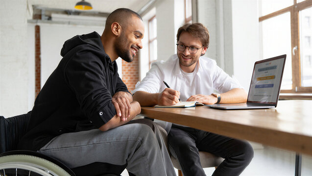 Two men collaborating on a project in a modern office setting