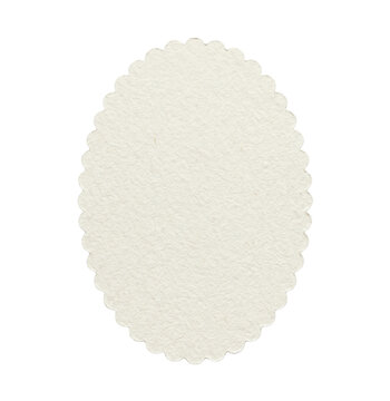 White scalloped oval paper label isolated. Stationery mockup and craft decoration.
